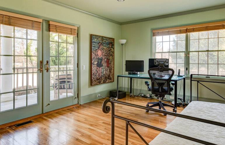 491 Butter Lane Bridgehampton, NY 11932 - Photo 27 of 39 a view of a workspace with furniture and a window