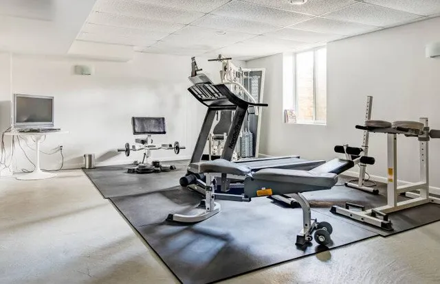 a view of a room with gym equipment