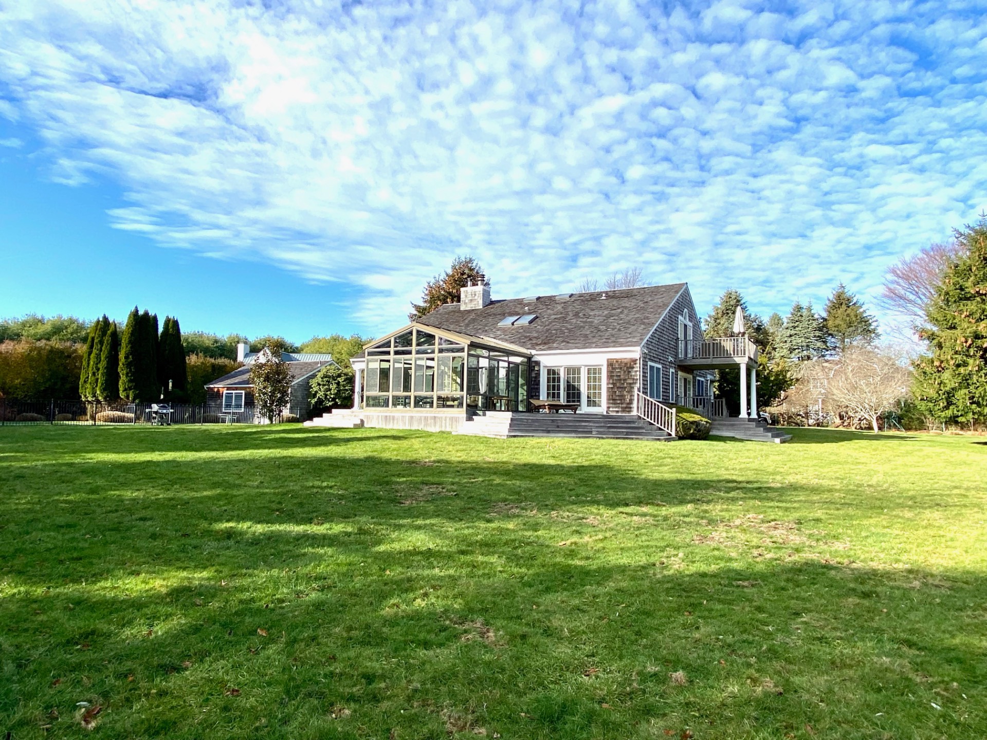 491 Butter Lane Bridgehampton, NY 11932 - Photo 39 of 39 a front view of a house with garden