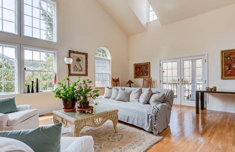 491 Butter Lane Bridgehampton, NY 11932 - Photo 6 of 39 a living room with furniture potted plant and windows