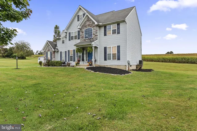 a view of a house with a big yard