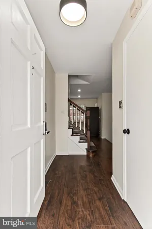 a view of an entryway with hardwood