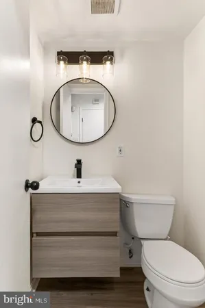 a kitchen with stainless steel appliances granite countertop a stove and a refrigerator