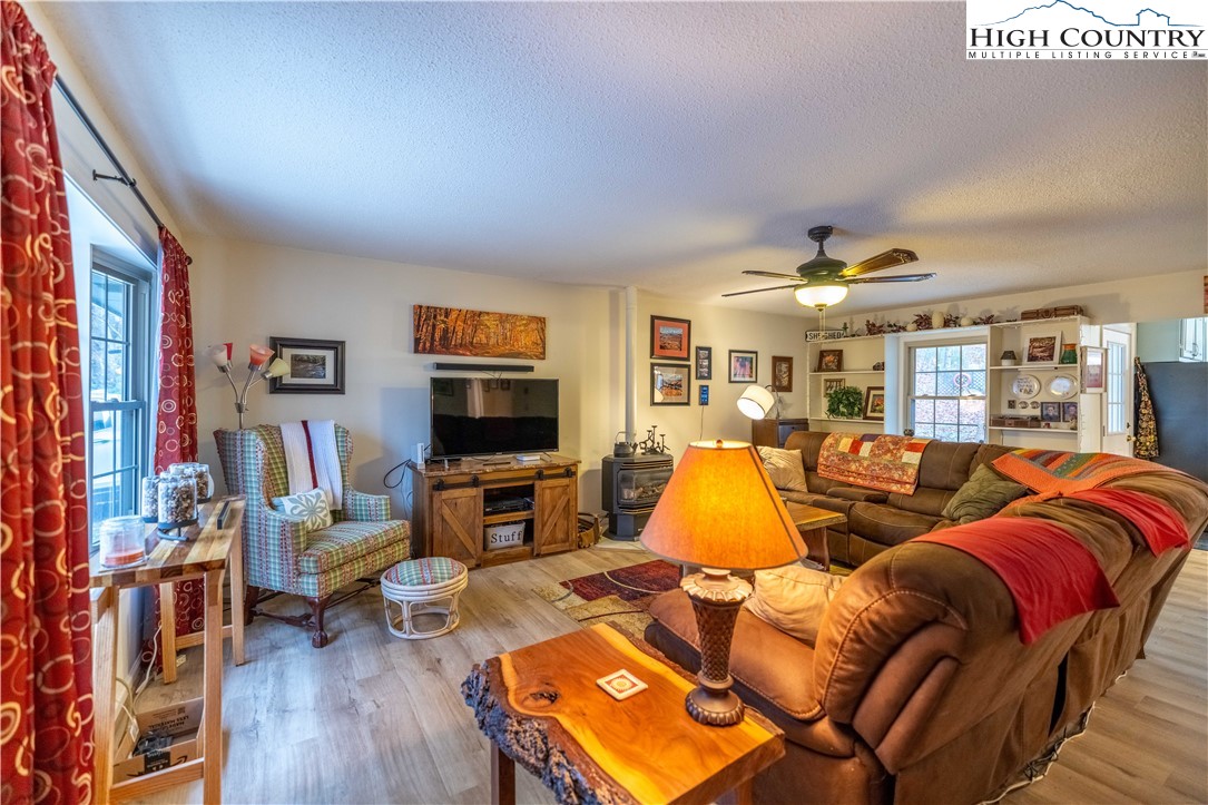 150 Timberlake Sparta, NC 28675 - Photo 15 of 36 a living room with furniture and a flat screen tv