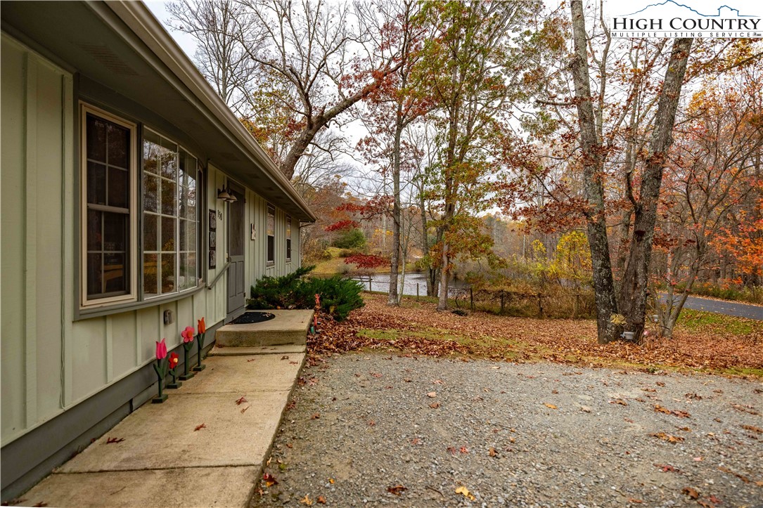 150 Timberlake Sparta, NC 28675 - Photo 5 of 36 a view of a house with a yard