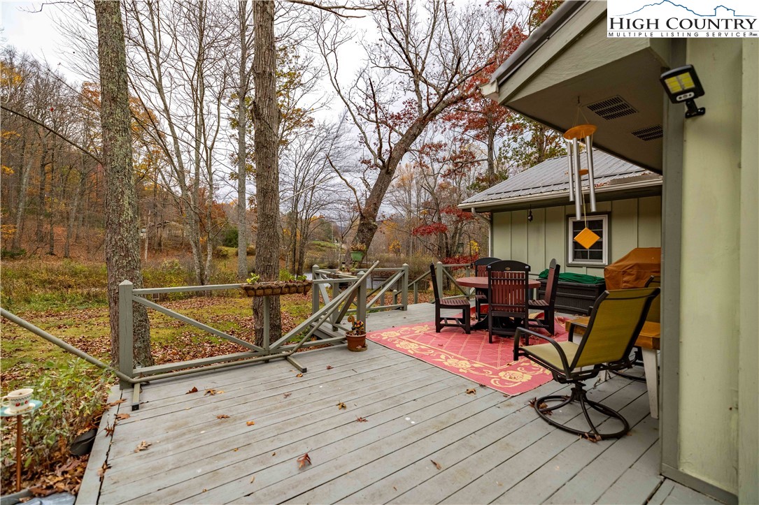 150 Timberlake Sparta, NC 28675 - Photo 9 of 36 a view of backyard with a table and chairs