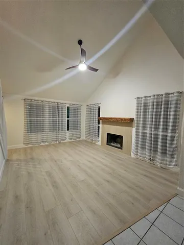 a view of a livingroom with a fireplace