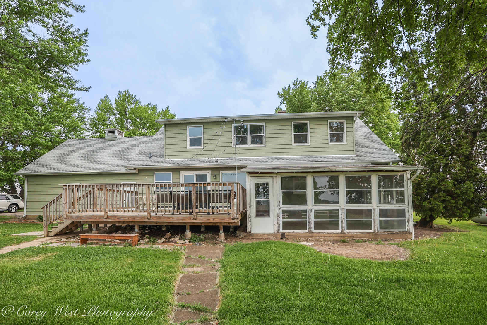 8994 Highway 64 Sycamore, IL 60178 - Photo 4 of 37 a view of a house with a backyard