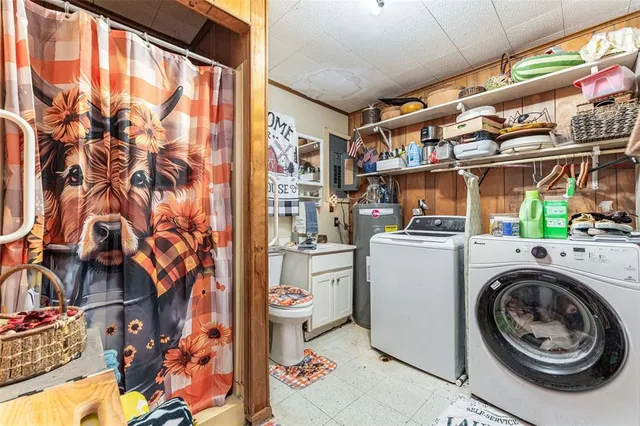 a utility room with dryer and washer