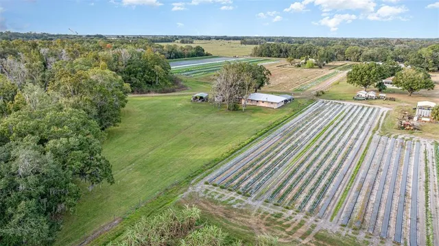 a view of a lake with a yard