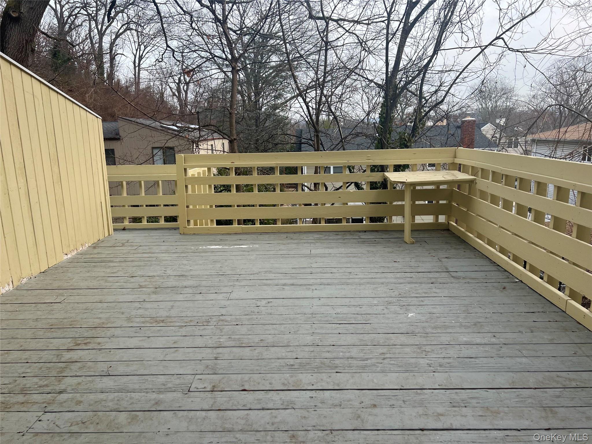 60 Marwood Road North, Unit B / RIGHT Port Washington, NY 11050 - Photo 18 of 19 a view of a couches with wooden fence