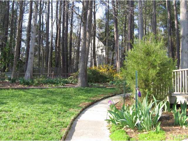 210 Winterberry Ridge Drive Durham, NC 27713 - Photo 15 of 24 Fenced and landscaped side/back yard