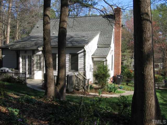210 Winterberry Ridge Drive Durham, NC 27713 - Photo 20 of 24 Large back deck from which to enjoy the park-like setting. Pet door gives your dog or cat access from the kitchen to small roofed enclosure and then to the yard. Sidewalk ends in a ramp to the back deck.