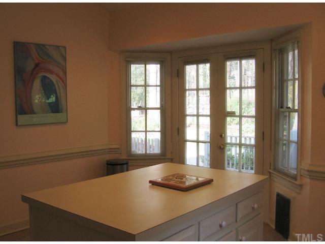 210 Winterberry Ridge Drive Durham, NC 27713 - Photo 10 of 24 Kitchen island and lovely view
