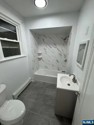 a bathroom with a sink and a toilet