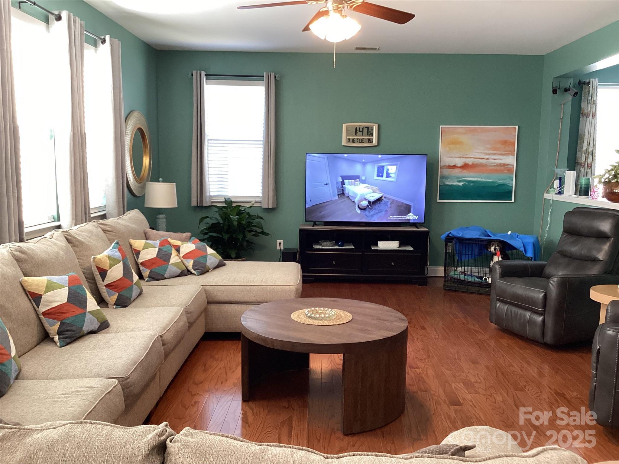 408 Indigo Ridge Drive Columbia, SC 29229 - Photo 3 of 17 a living room with furniture a window and a flat screen tv