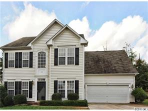 118 Hollyhurst Lane Fort Mill, SC 29708 - Photo 1 of 16 a front view of a house with garden