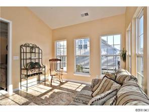 118 Hollyhurst Lane Fort Mill, SC 29708 - Photo 15 of 16 a living room with furniture and a floor to ceiling window