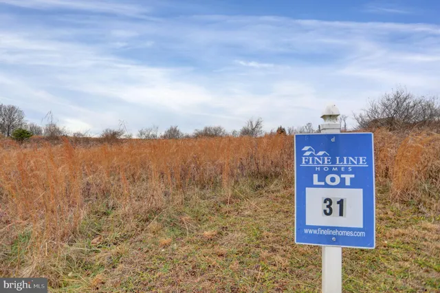 a sign board with an ocean view