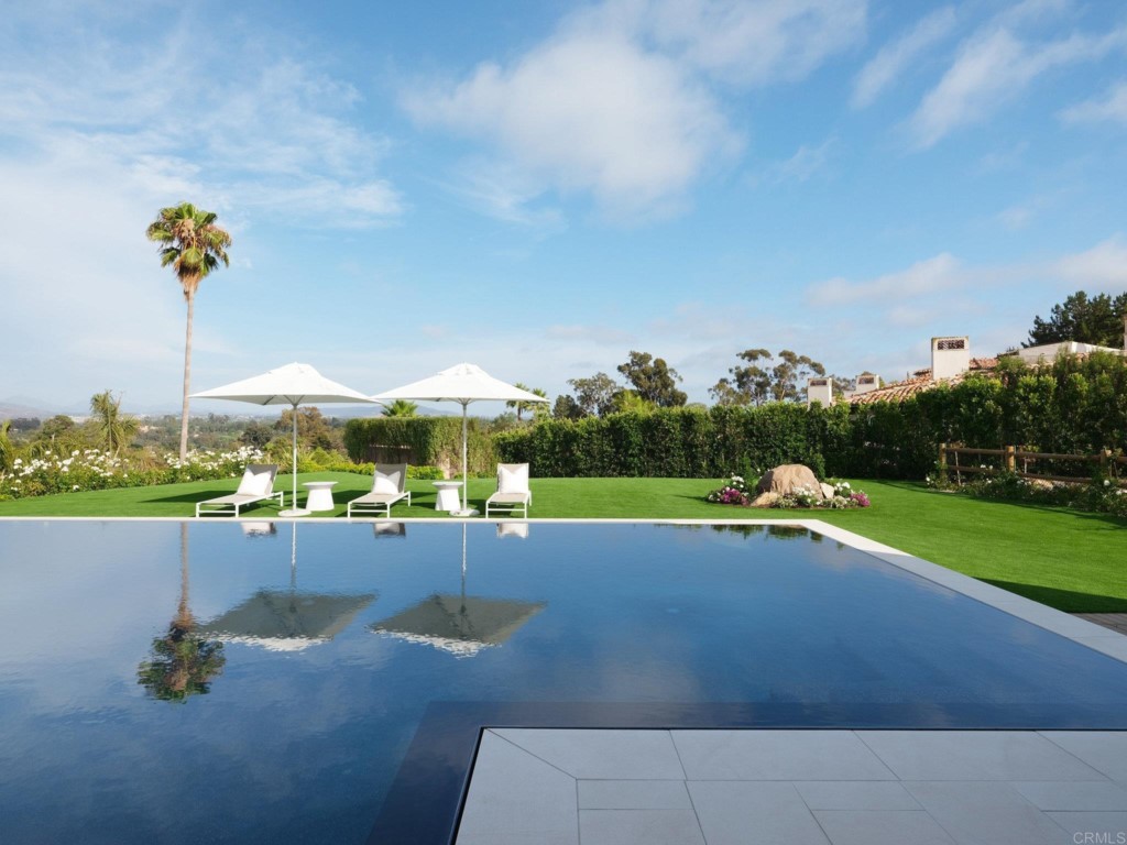 5516 La Crescenta Road Rancho Santa Fe, CA 92067 - Photo 14 of 68 a view of swimming pool from a lounge chair