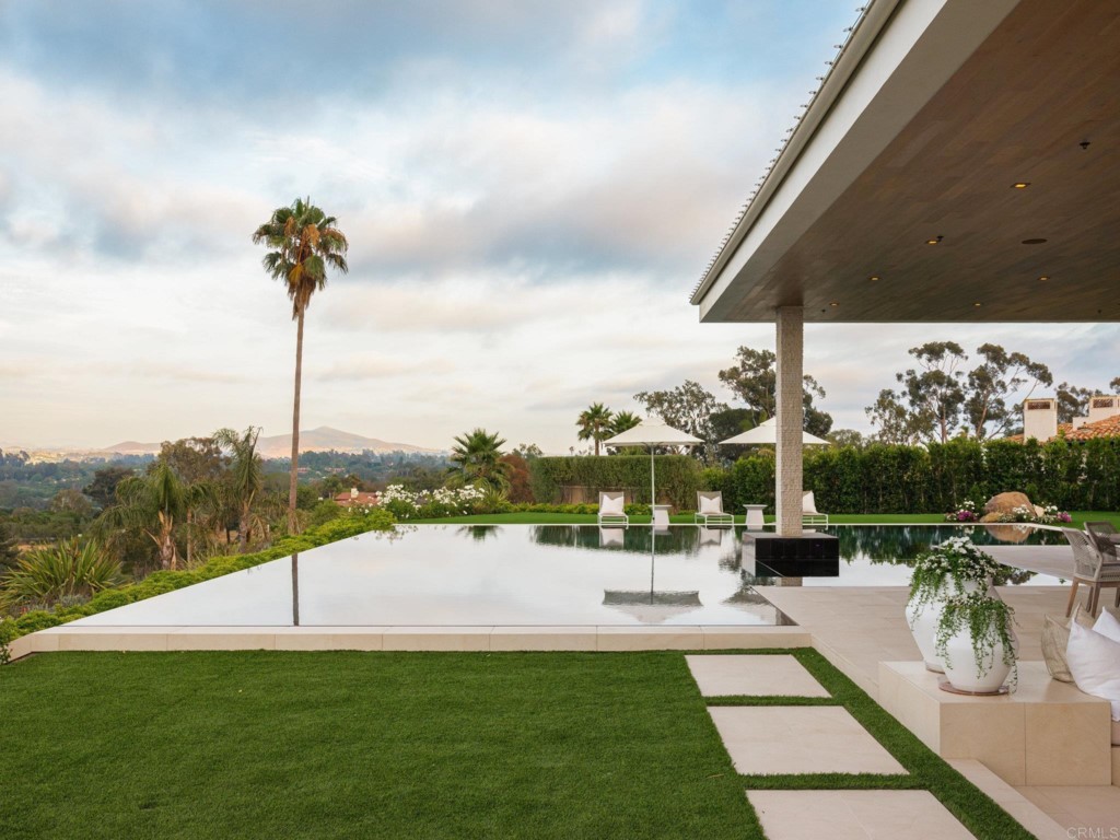 5516 La Crescenta Road Rancho Santa Fe, CA 92067 - Photo 19 of 68 a view of a swimming pool with a patio
