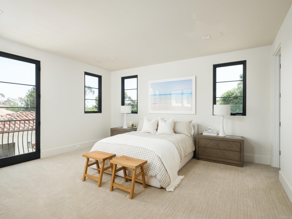 5516 La Crescenta Road Rancho Santa Fe, CA 92067 - Photo 47 of 68 a bedroom with a bed and a window
