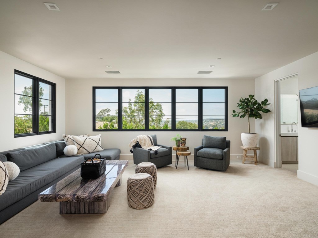5516 La Crescenta Road Rancho Santa Fe, CA 92067 - Photo 49 of 68 a living room with furniture and a large window
