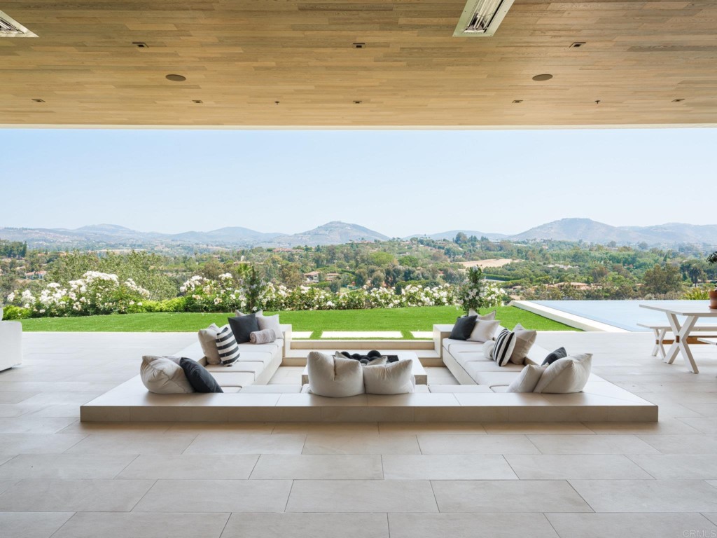 5516 La Crescenta Road Rancho Santa Fe, CA 92067 - Photo 5 of 68 a view of swimming pool with outdoor seating and mountain view