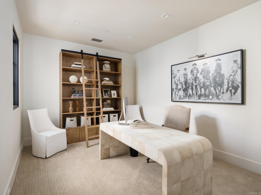 5516 La Crescenta Road Rancho Santa Fe, CA 92067 - Photo 57 of 68 a living room with furniture and a book shelf