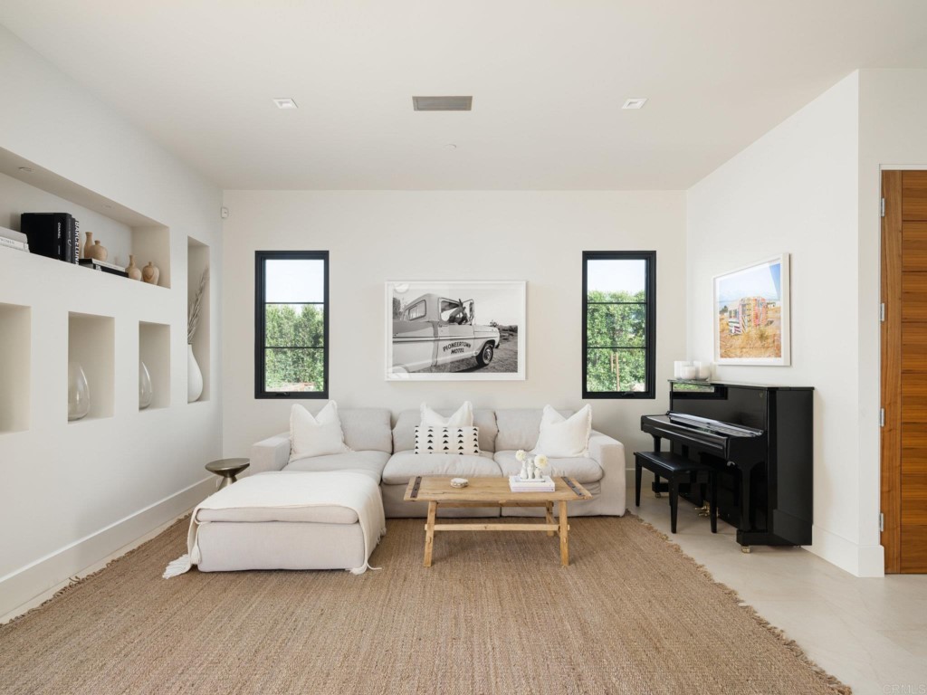 5516 La Crescenta Road Rancho Santa Fe, CA 92067 - Photo 58 of 68 a living room with furniture and a window