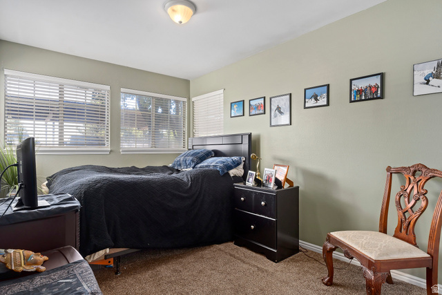650 South Main Street, Unit 4104 Bountiful, UT 84010 - Photo 14 of 22 Carpeted bedroom featuring baseboards