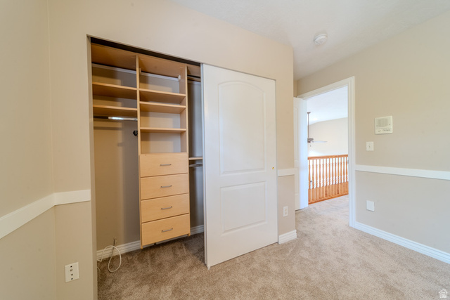 598 Hollow Creek Road Draper, UT 84020 - Photo 78 of 110 Built-in closet organization system featuring adjustable shelving and four drawers
