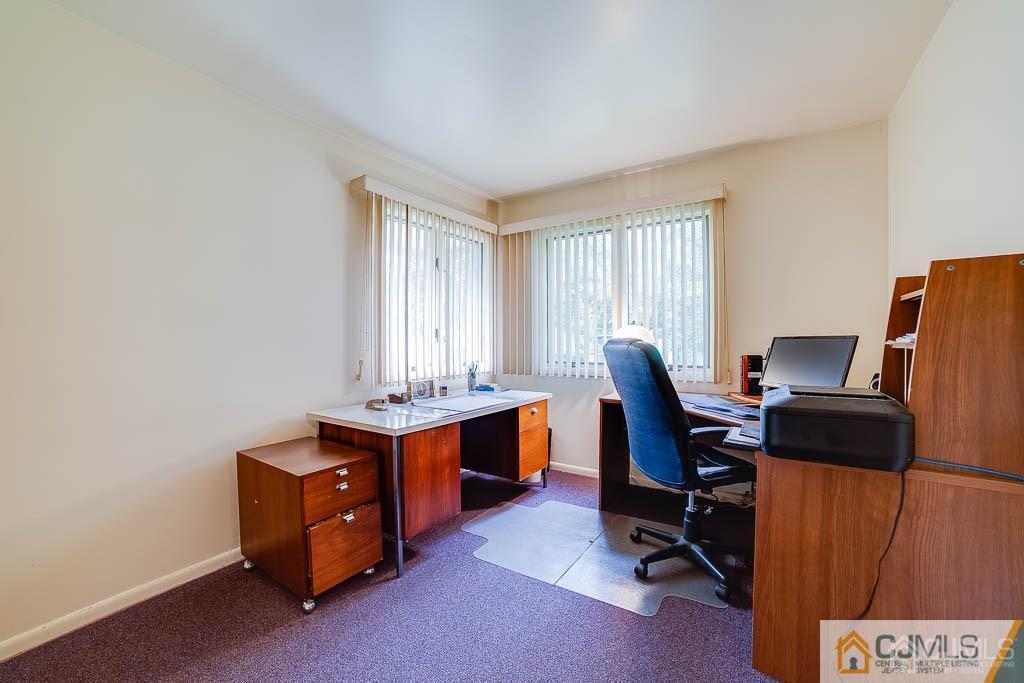 9 Pyne Road Kendall Park, NJ 08824 - Photo 6 of 10 a view of workspace with wooden floor and windows