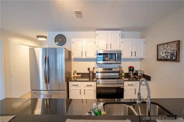 $289,500 | 875 Parkside Place, Unit A407, Osage Beach, MO 65065