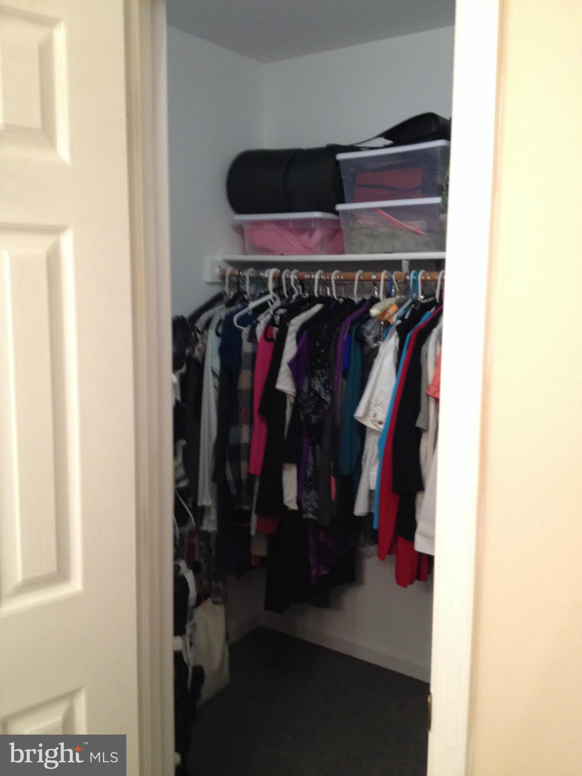 7244 Wilson Road Marshall, VA 20115 - Photo 17 of 30 a view of walk in closet with clothes and shoes