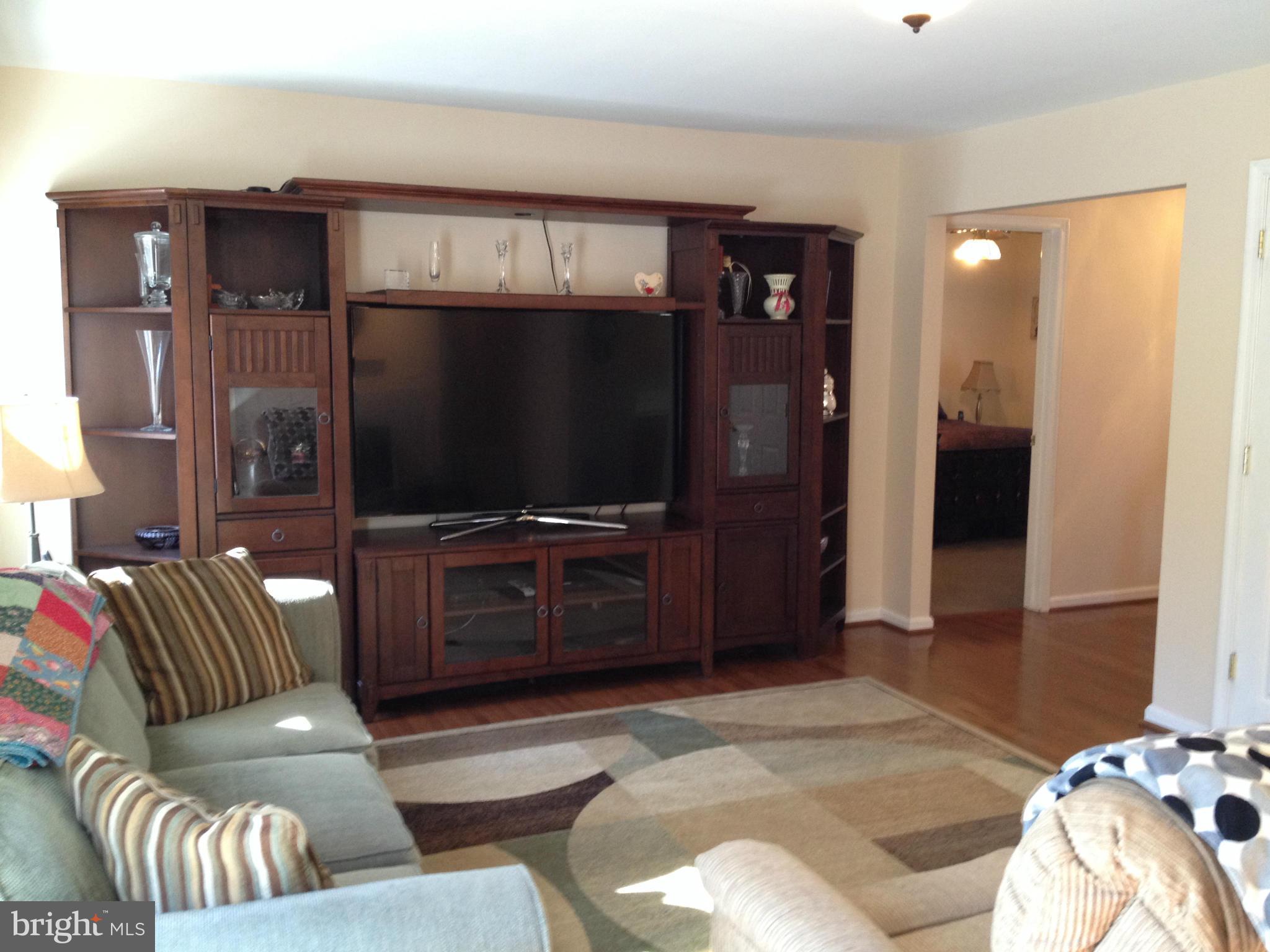 7244 Wilson Road Marshall, VA 20115 - Photo 3 of 30 a living room with furniture and a flat screen tv