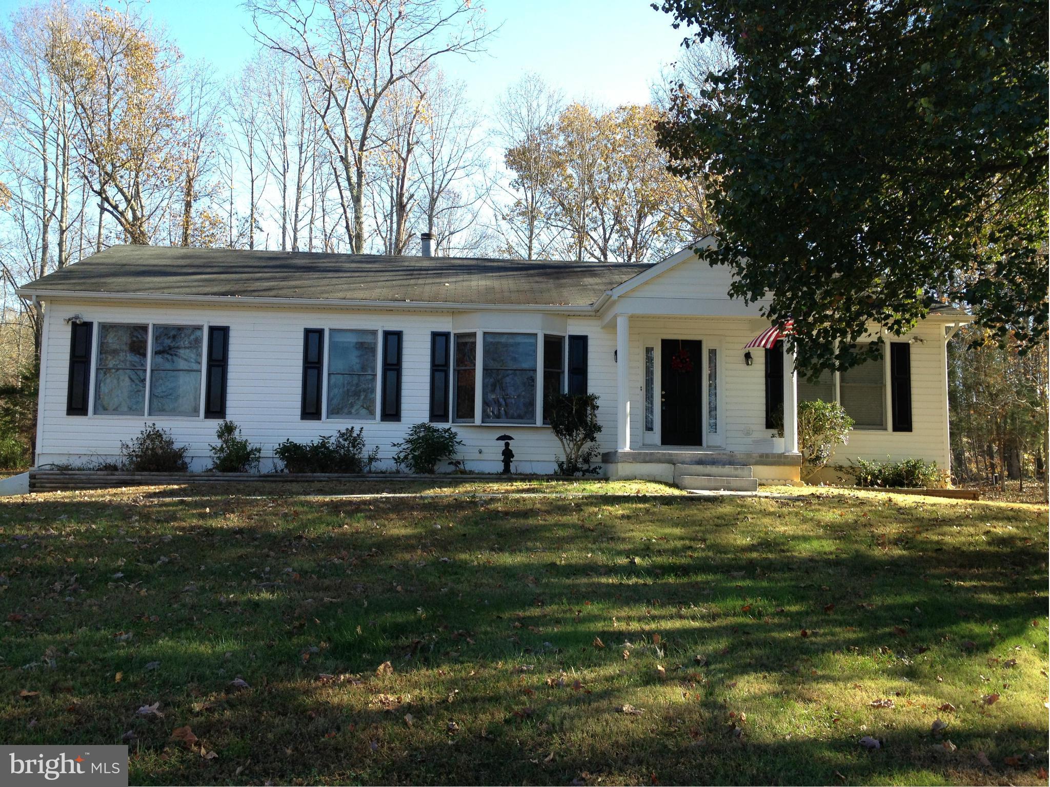 7244 Wilson Road Marshall, VA 20115 - Photo 27 of 30 a front view of a house with a garden