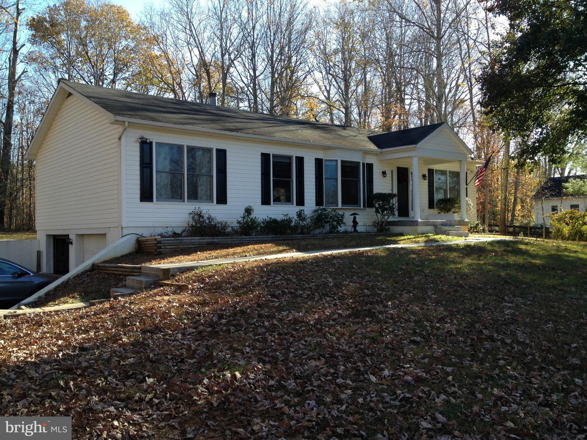 7244 Wilson Road Marshall, VA 20115 - Photo 28 of 30 a front view of a house with garden