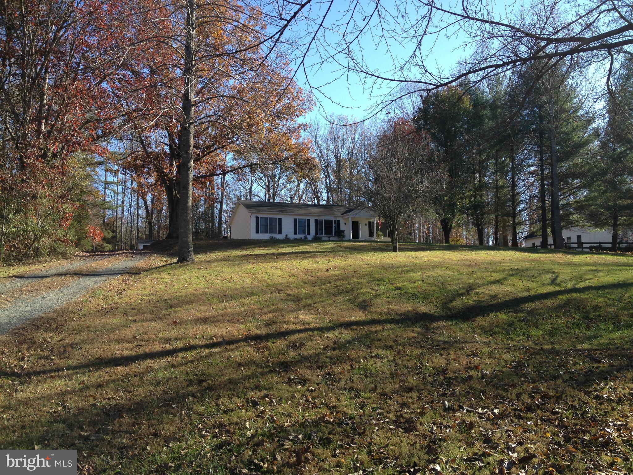 7244 Wilson Road Marshall, VA 20115 - Photo 30 of 30 a view of a house with a yard