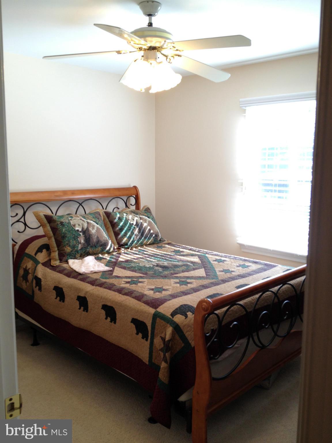 7244 Wilson Road Marshall, VA 20115 - Photo 10 of 30 a bedroom with a bed and a dresser