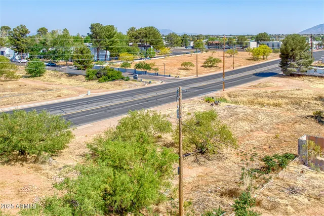 a view of a balcony with an ocean beach
