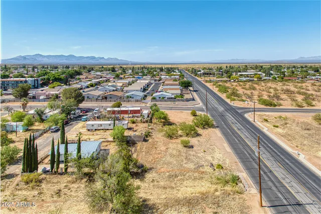 a view of city with ocean