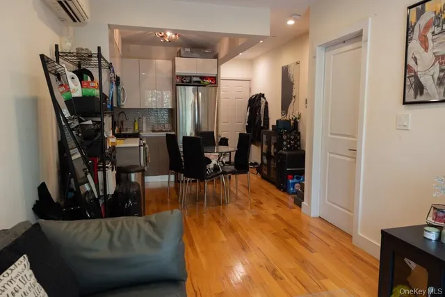 a view of a room that has a window and a porch