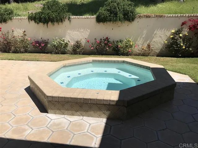 a view of swimming pool from a lake