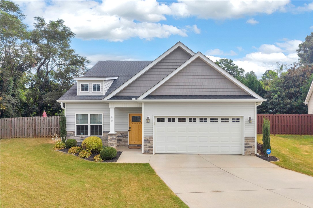 5 Drakeford Court Anderson, SC 29621 - Photo 7 of 46 Craftsman details and a neat driveway define the welcoming facade of this contemporary residence.