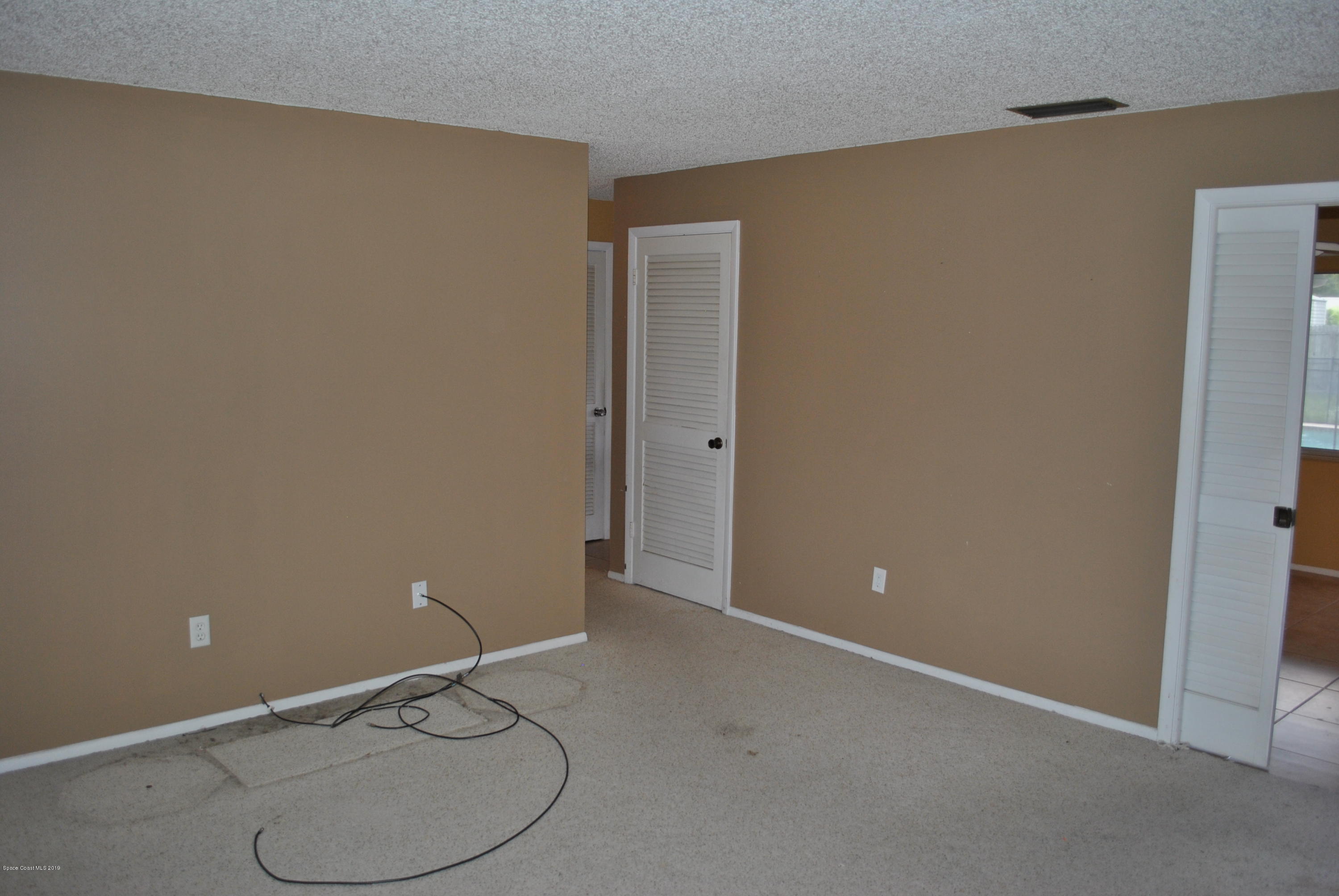 1167 Cotton Road Northeast Palm Bay, FL 32905 - Photo 15 of 34 an empty room