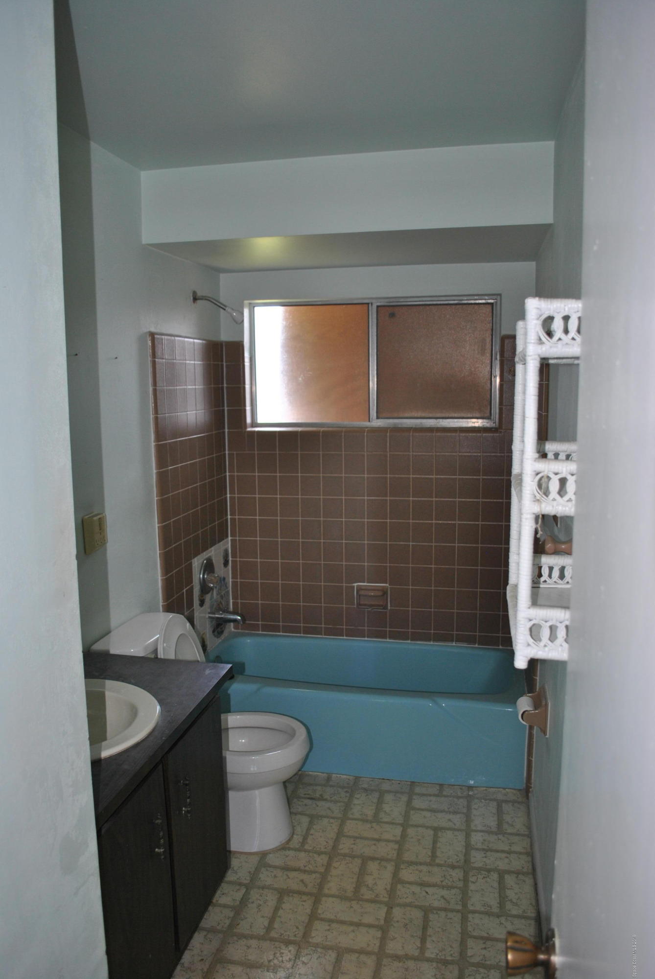 1167 Cotton Road Northeast Palm Bay, FL 32905 - Photo 23 of 34 a bathroom with a sink a toilet and shower