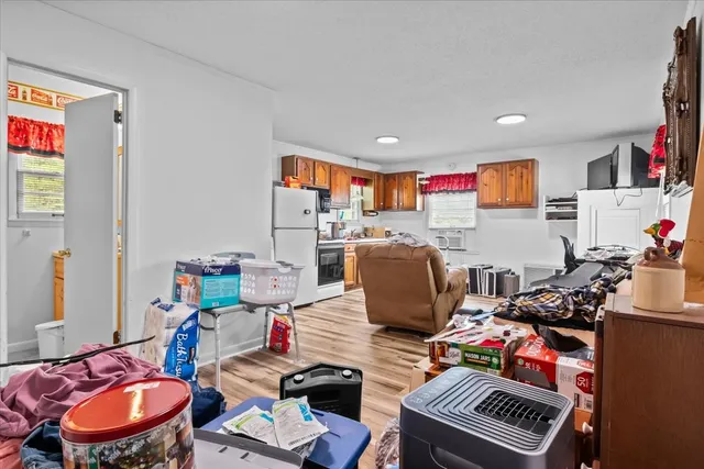 a kitchen with a stove top oven sink and cabinets
