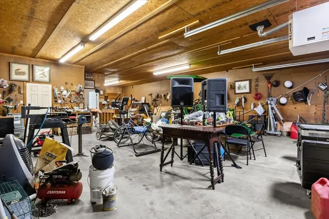 a view of a chairs and table in patio