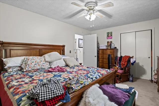 a bathroom with a sink mirror and window
